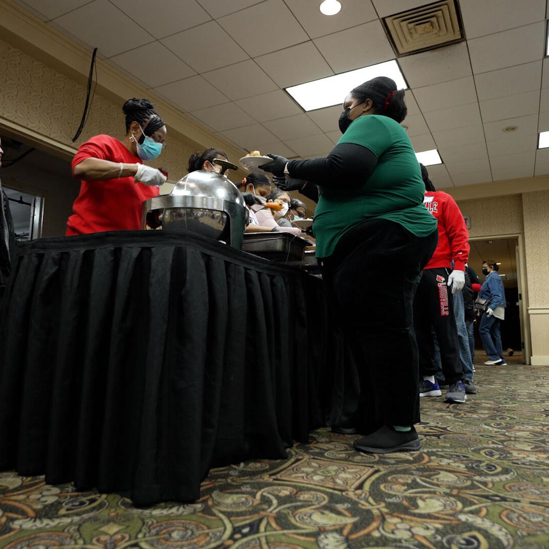 Volunteers serve Thanksgiving meals at Louisville's Wayside Christian Mission